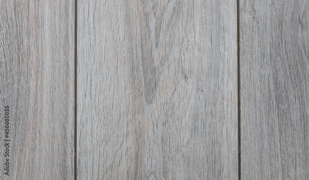 Naklejka premium Texture of gray wood laminate or parquet.