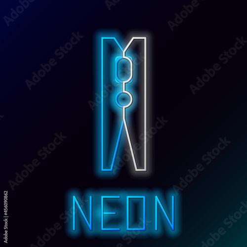 Glowing neon line Old wood clothes pin icon isolated on black background. Clothes peg. Colorful outline concept. Vector