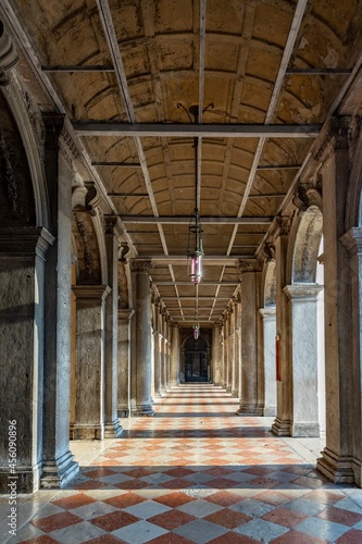 colonnade at St. Mark s square with shadow in early morning in Venice