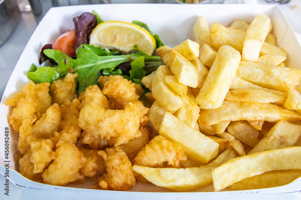 Scottish Pittenweem prawns deep fried in batter with French fries Scottish Pittenweem prawns deep fried in batter with French fries