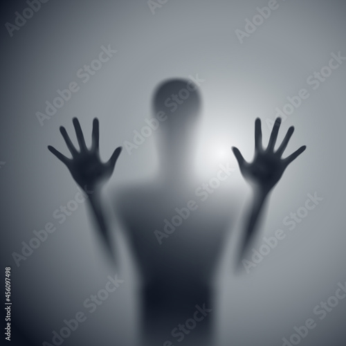 Shadow Blur of Horror Man Behind the Matte Glass. Blurry Hand, Body Figure Abstraction, and Two Palms. The Reflection of the Silhouette Through the Light