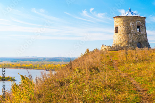 Tower of an ancient Bulgarian fortress on hill, bank of the Kama River, Elabuga, Russia. Ancient watchtower photo