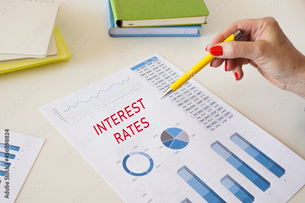 Financial concept meaning INTEREST RATES with phrase on the sheet. Financial concept meaning INTEREST RATES with phrase on the sheet.