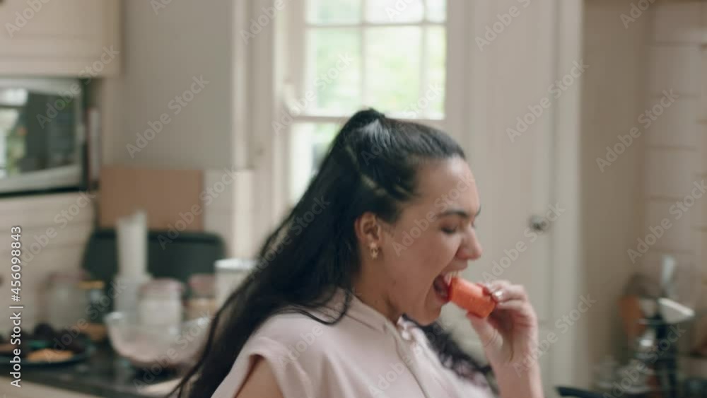 happy overweight teenage girl dancing in kitchen having fun celebrating healthy diet preparing food at home enjoying lifestyle commitment happy overweight teenage girl dancing in kitchen having fun celebrating healthy diet preparing food at home enjoying lifestyle commitment