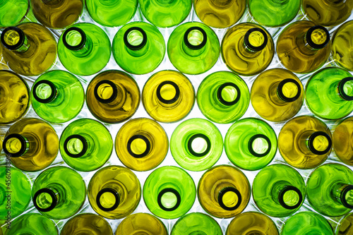 WINE EMPTY BOTTLES PATTERN. GLASS RECYCLING CONCEPT AND SUSTAINABILITY. TOP VIEW.                     photo