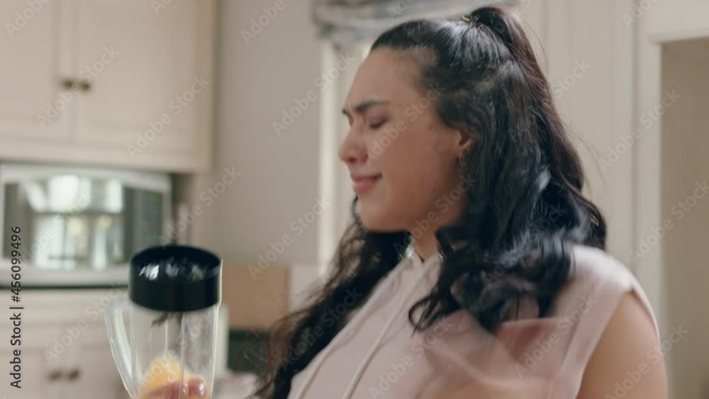 happy overweight teenage girl dancing in kitchen making smoothie having fun celebrating healthy diet at home enjoying lifestyle commitment happy overweight teenage girl dancing in kitchen making smoothie having fun celebrating healthy diet at home enjoying lifestyle commitment