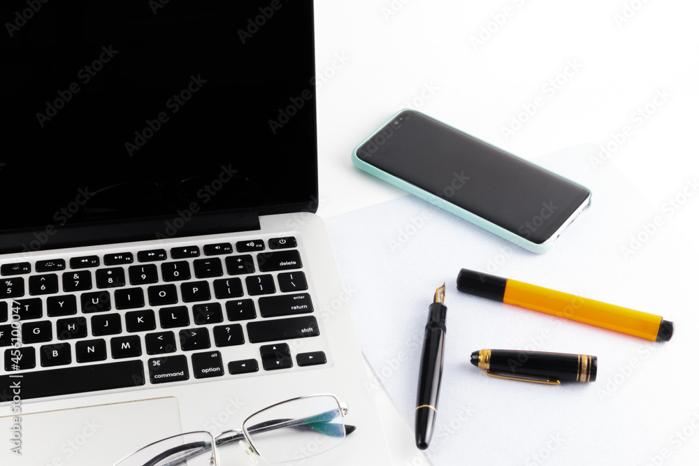 Quarantined workplace with a computer a syringe and a vaccine as a symbol of vaccination to protect people. on white background Quarantined workplace with a computer a syringe and a vaccine as a symbol of vaccination to protect people. on white background