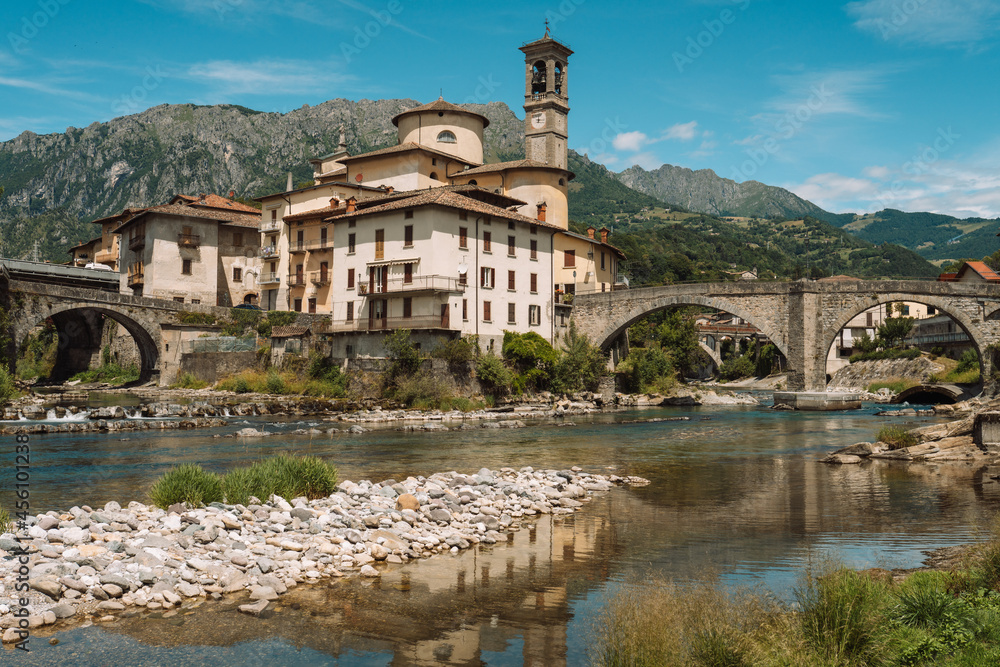San Giovanni Bianco, seen from the Brembo river, Lombardy, Italy. Village of Two Rivers, small town in northern Italy.