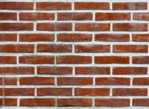 red brick wall with white borders