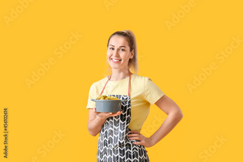 Young housewife with tasty ...