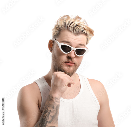 Non-binary young man on white background © Pixel-Shot