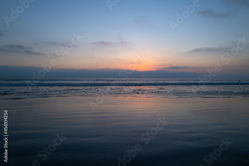 Panoramic view of sunset over ocean. Beautiful serene scene. Sea sky concept, sunrise colors clouds. Nature landscape, scenery beach. Summer vacation background.