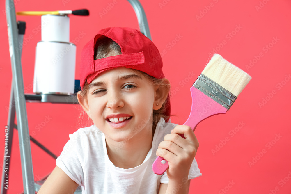Little painter with brush on color background Little painter with brush on color background