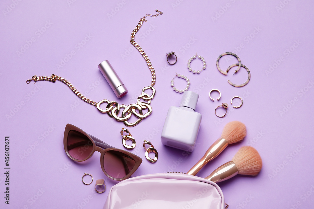 Set of female accessories and cosmetics on color background, closeup