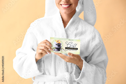 Young woman with gift certi...