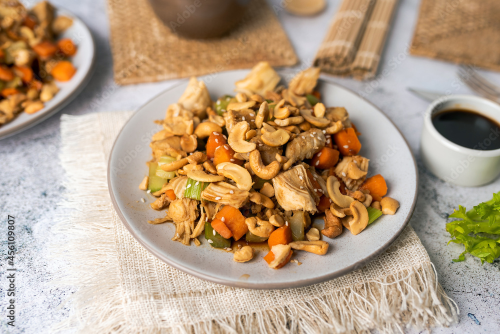 Fototapeta premium Cashew chicken, home made Chinese food with limited ingredients, healthy alternative to take out. 