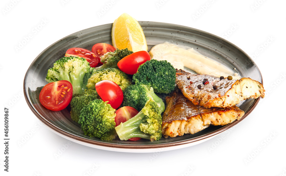 Plate with tasty baked cod fillet and vegetables on white background Plate with tasty baked cod fillet and vegetables on white background