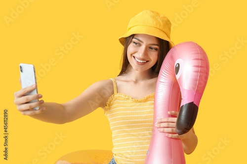 Young woman with inflatable...