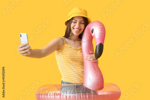 Young woman with inflatable...
