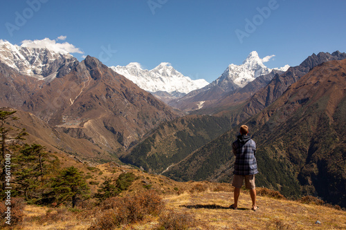 Trekker takes in spectacular view of famous Everest mountain range.