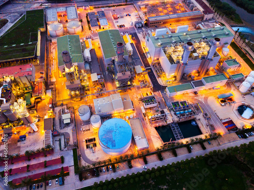Aerial night view of power plant and waste treatment plant in Barcelona ..