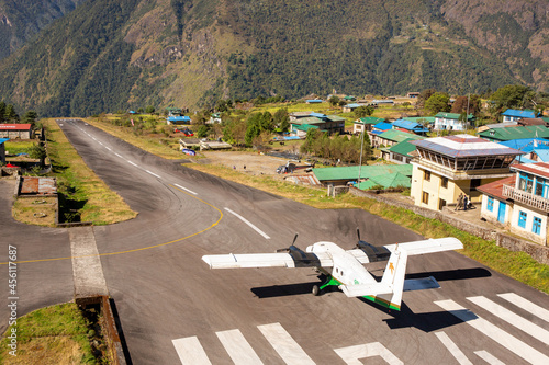 Airplane preparing for take off at Lukla airport, the most dangerous airport in the world. photo