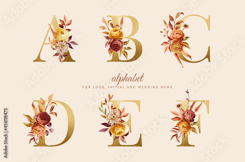 hand painted autumn floral alphabet set with red, yellow and brown flowers and leaves. Flowers composition for logo, cards, branding, etc