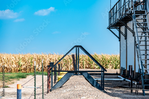 Ramp and stairs over a secondary containment dike for chemical oil storage confined space photo
