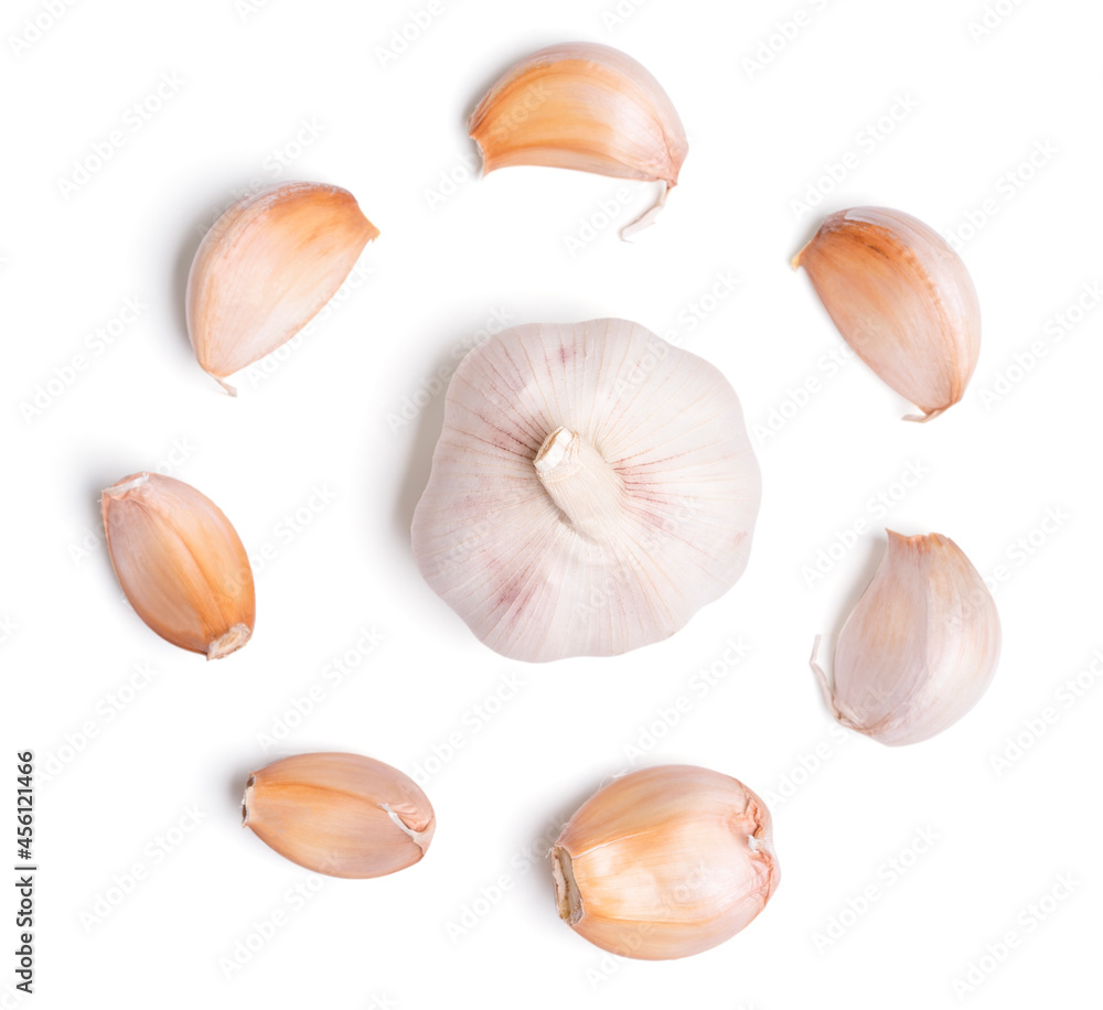 Fototapeta premium Top view fresh peeled garlic cloves on white background.