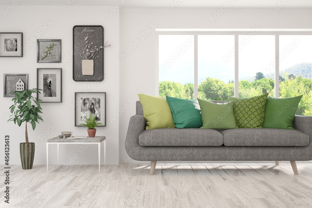 Naklejka premium White living room with sofa and summer landscape in window. Scandinavian interior design. 3D illustration