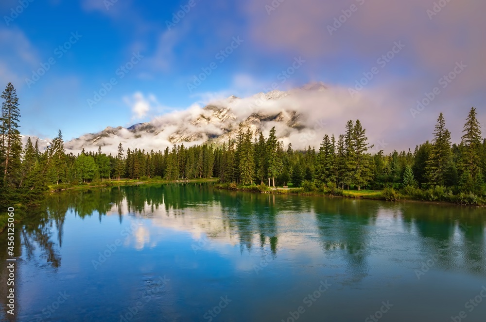 Cloudy Blue Sky Over A Mountain River Valley Cloudy Blue Sky Over A Mountain River Valley