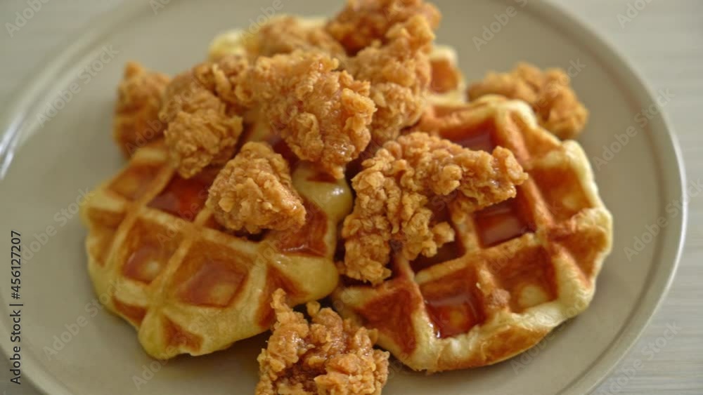 homemade fried chicken waffle with honey or maple syrup homemade fried chicken waffle with honey or maple syrup