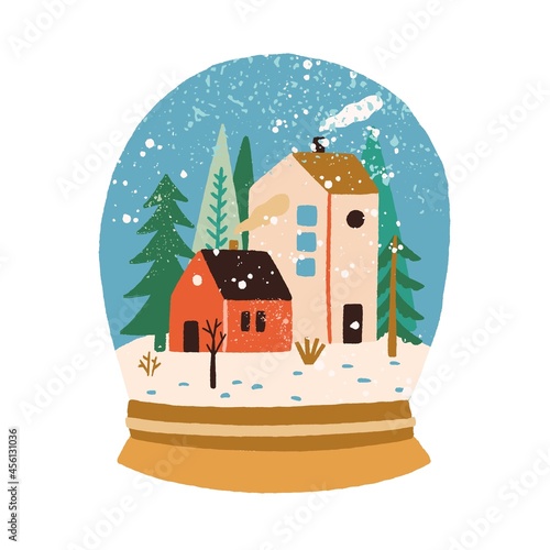 Christmas globe glass with houses, trees and snowflakes in winter. Xmas cryst...