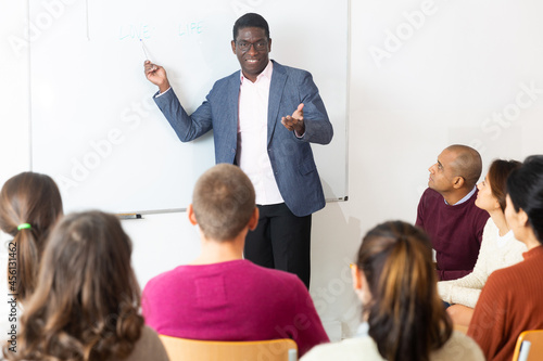 University teacher conducts a lesson for students
