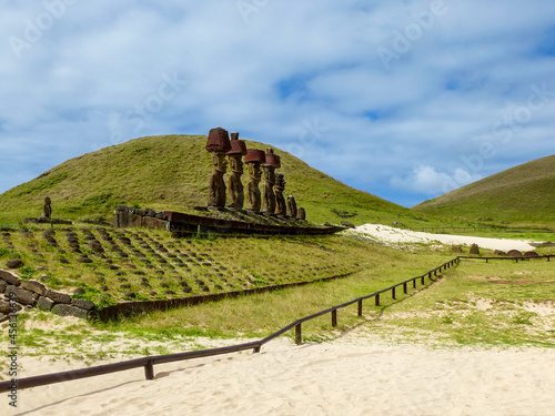 Moai statues on Easter Island. Ahu Tongariki against Blue Sky, Chile, South America photo