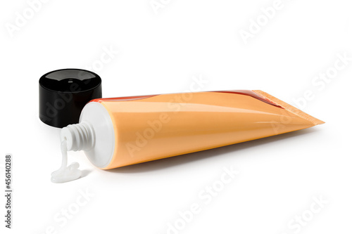 Cream, yellow tube of ointment on a white background. View from above. Full depth of field. With clipping path