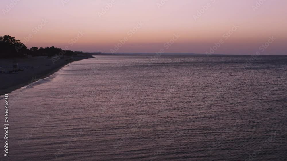 Aerial view of beautiful mediterranean sea and beach at sunrise, seascape of Calabria, Simeri Mare, Southern Italy Aerial view of beautiful mediterranean sea and beach at sunrise, seascape of Calabria, Simeri Mare, Southern Italy