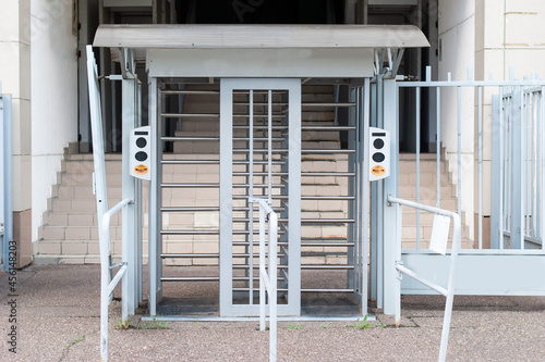 A turnstile at the stadium for spectators to pass by passes.