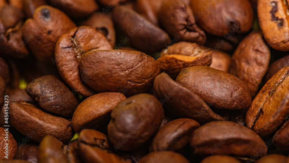 Freshly roasted coffee beans background Freshly roasted coffee beans background