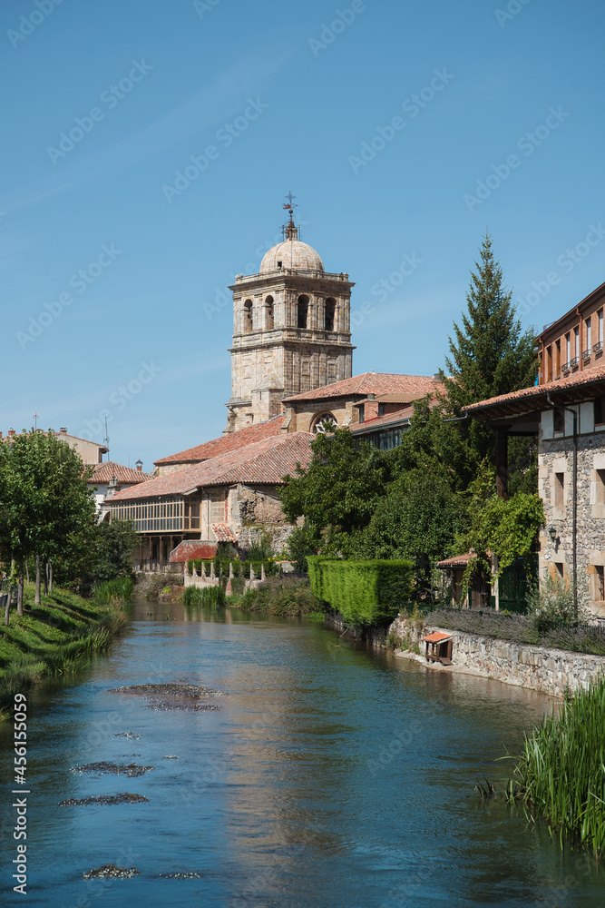 View of the bell tower and the river in Aguilar de Campoo, Palencia, Spain.