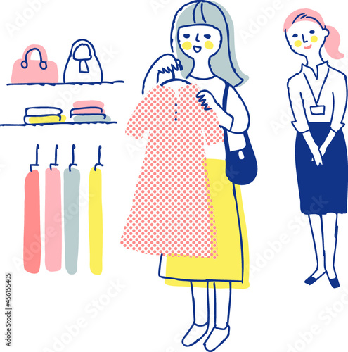 洋服を選んでいる若い女性
