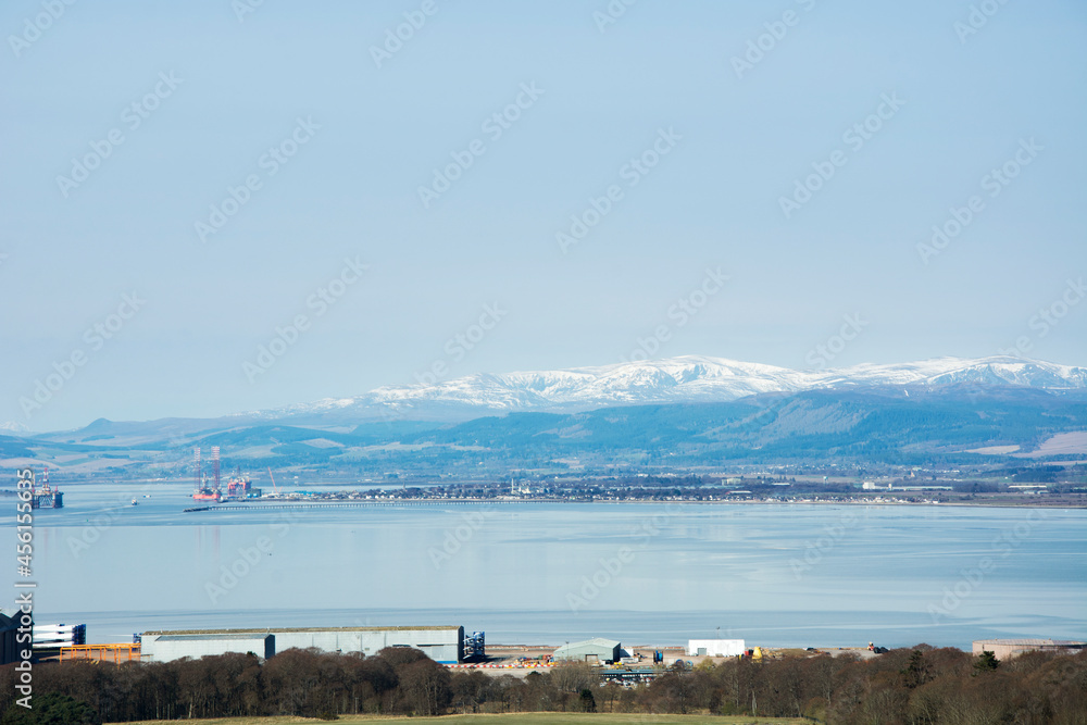 Invergordon nestled on the shore of the inner Cromarty Firth with Ben Wyvis in the background