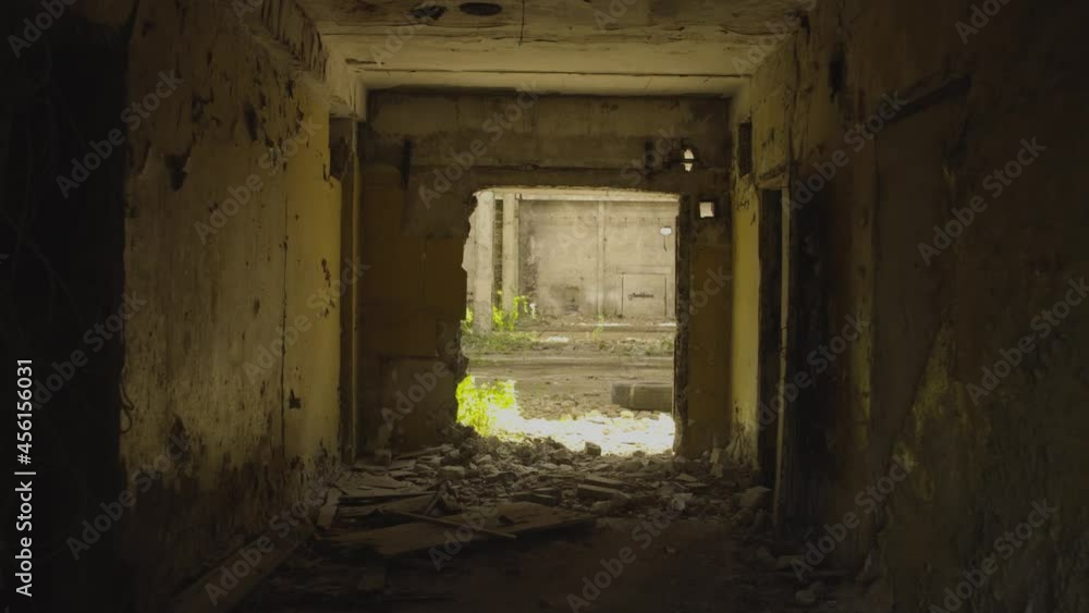Old abandoned factory building - entrance through the arch Old abandoned factory building - entrance through the arch