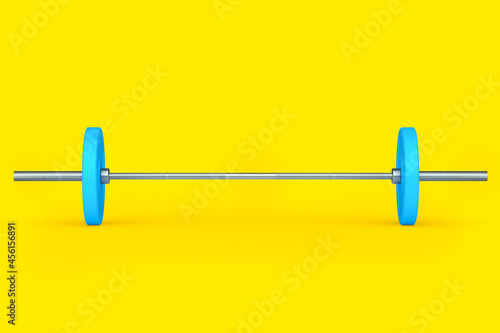 Abstract metal barbell with blue disks isolated on yellow background