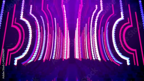 Neon lights in cyberspace. Abstract background. A matrix of vertical curved neon lights illuminates cyberspace for dance battles. The video can be looped.