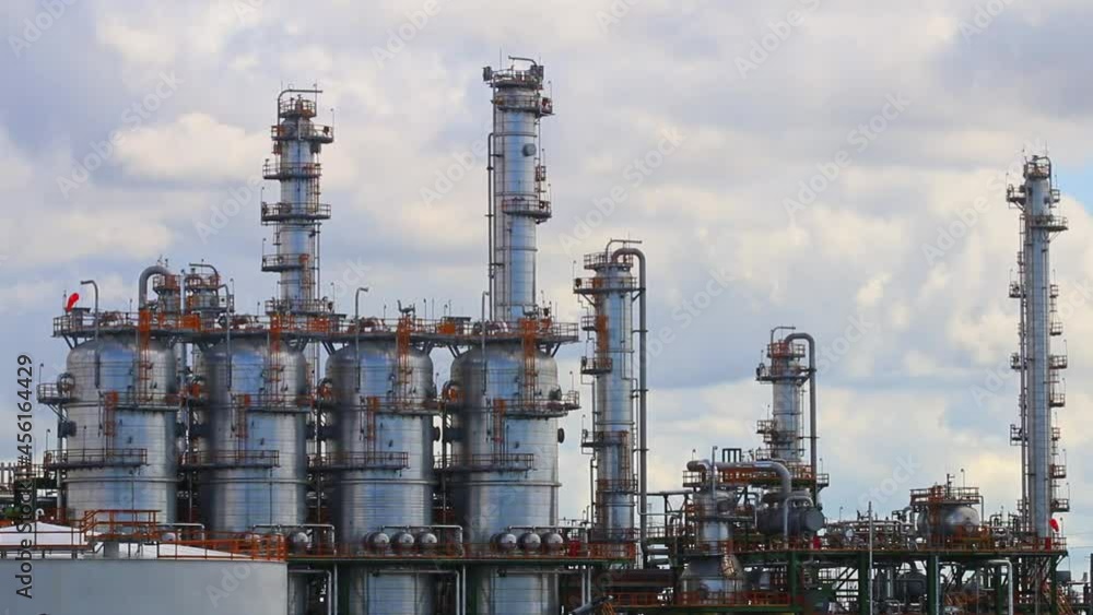 Refinery tower in petroleum process area with cloudy sky, Time Lapse Refinery tower in petroleum process area with cloudy sky, Time Lapse