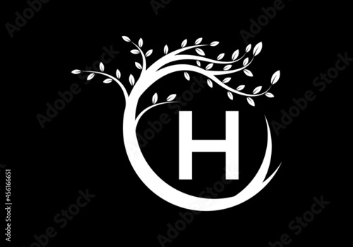 Creative Letter H Black and white monogram alphabet with tree. Green, eco-friendly logo concept. Modern vector logo for ecological business and company identity
