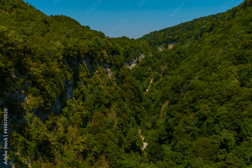 OKATSE, GEORGIA: Beautiful scenic landscape in Okatse Canyon on a sunny summer day. OKATSE, GEORGIA: Beautiful scenic landscape in Okatse Canyon on a sunny summer day.