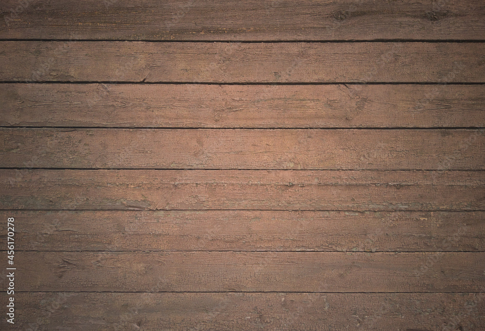 Fototapeta premium The background is made of old painted wooden boards of beige color