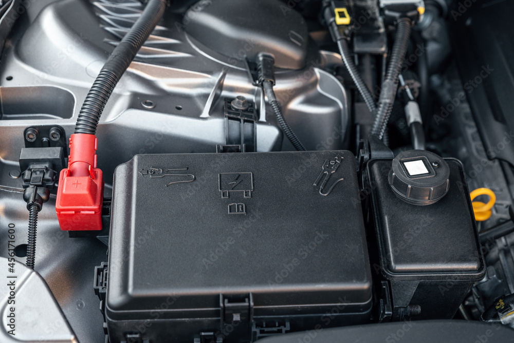 Fototapeta premium Battery car engine detail - close up of machine new batteries.